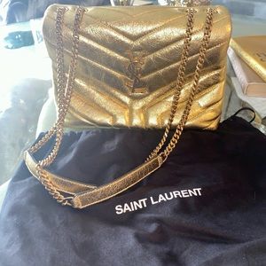 Saint lurent gold hand bag